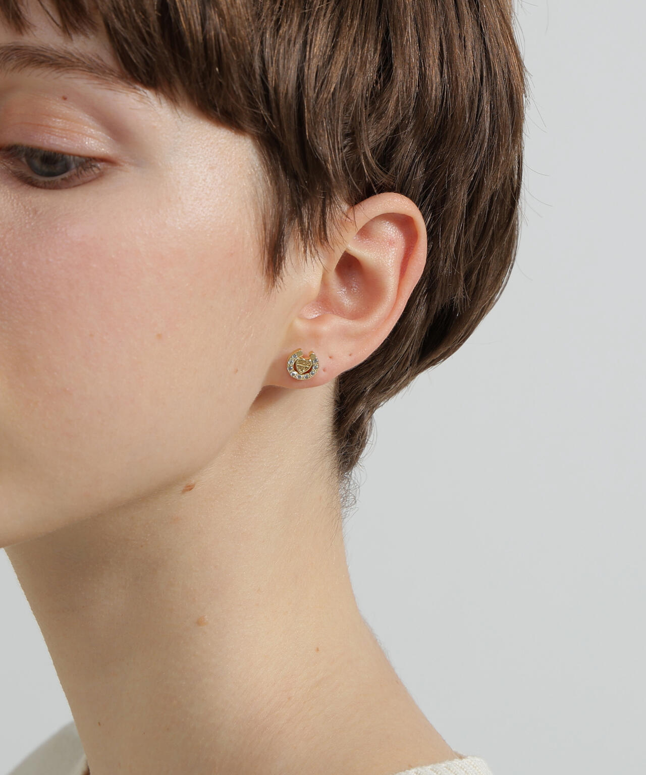 HEART HORSESHOE CZ EARRING by J.H.M CO.LTD.